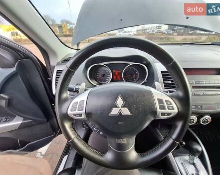 Черный Мицубиси Аутлендер ХЛ, объемом двигателя 2.36 л и пробегом 211 тыс. км за 10500 $, фото 10 на Automoto.ua