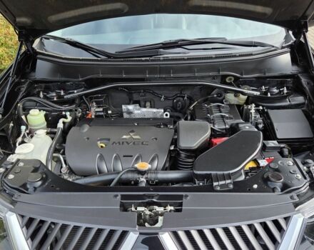 Черный Мицубиси Аутлендер ХЛ, объемом двигателя 2.4 л и пробегом 31 тыс. км за 15000 $, фото 18 на Automoto.ua