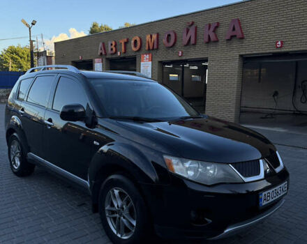 Черный Мицубиси Аутлендер ХЛ, объемом двигателя 2 л и пробегом 281 тыс. км за 9000 $, фото 1 на Automoto.ua