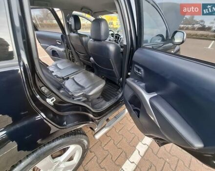 Черный Мицубиси Аутлендер ХЛ, объемом двигателя 2.36 л и пробегом 211 тыс. км за 10500 $, фото 16 на Automoto.ua