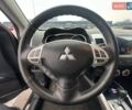 Черный Мицубиси Аутлендер ХЛ, объемом двигателя 2.36 л и пробегом 250 тыс. км за 10000 $, фото 16 на Automoto.ua