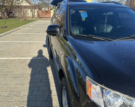 Черный Мицубиси Аутлендер ХЛ, объемом двигателя 2.4 л и пробегом 198 тыс. км за 11000 $, фото 5 на Automoto.ua