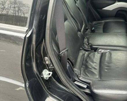 Черный Мицубиси Аутлендер ХЛ, объемом двигателя 2.36 л и пробегом 250 тыс. км за 10000 $, фото 22 на Automoto.ua