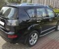 Черный Мицубиси Аутлендер ХЛ, объемом двигателя 2.4 л и пробегом 31 тыс. км за 15000 $, фото 3 на Automoto.ua