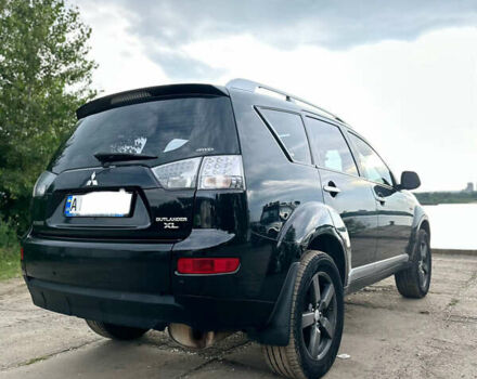 Черный Мицубиси Аутлендер ХЛ, объемом двигателя 2.4 л и пробегом 212 тыс. км за 9350 $, фото 36 на Automoto.ua