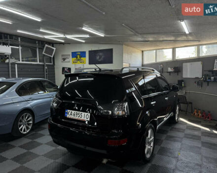 Чорний Міцубісі Аутлендер ХЛ, об'ємом двигуна 3 л та пробігом 243 тис. км за 12500 $, фото 31 на Automoto.ua