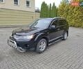 Черный Мицубиси Аутлендер ХЛ, объемом двигателя 2.4 л и пробегом 127 тыс. км за 10500 $, фото 4 на Automoto.ua