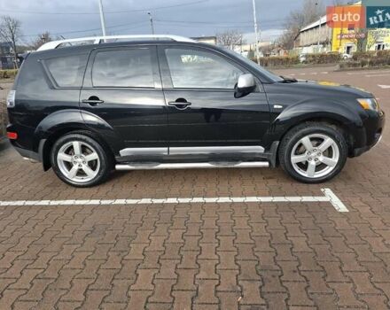 Черный Мицубиси Аутлендер ХЛ, объемом двигателя 2.36 л и пробегом 211 тыс. км за 10500 $, фото 3 на Automoto.ua