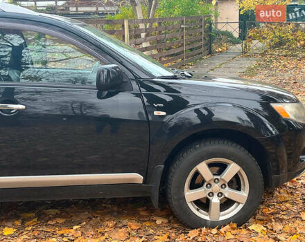 Черный Мицубиси Аутлендер ХЛ, объемом двигателя 3 л и пробегом 285 тыс. км за 9590 $, фото 15 на Automoto.ua