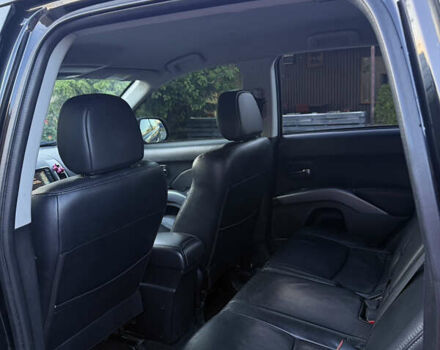 Черный Мицубиси Аутлендер ХЛ, объемом двигателя 2 л и пробегом 281 тыс. км за 9000 $, фото 8 на Automoto.ua