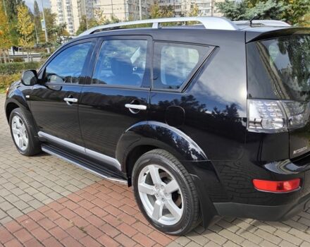 Черный Мицубиси Аутлендер ХЛ, объемом двигателя 2.4 л и пробегом 31 тыс. км за 15000 $, фото 4 на Automoto.ua