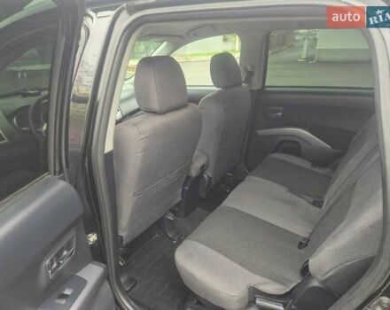 Черный Мицубиси Аутлендер ХЛ, объемом двигателя 2.36 л и пробегом 87 тыс. км за 11500 $, фото 7 на Automoto.ua