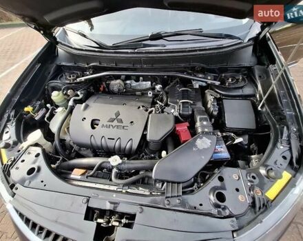 Черный Мицубиси Аутлендер ХЛ, объемом двигателя 2.36 л и пробегом 211 тыс. км за 10500 $, фото 7 на Automoto.ua