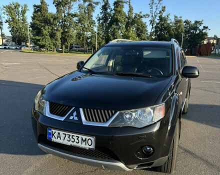 Черный Мицубиси Аутлендер ХЛ, объемом двигателя 2.36 л и пробегом 115 тыс. км за 12000 $, фото 1 на Automoto.ua