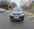Черный Мицубиси Аутлендер ХЛ, объемом двигателя 2.36 л и пробегом 87 тыс. км за 11500 $, фото 18 на Automoto.ua