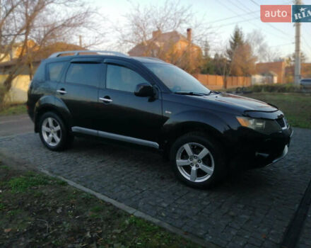 Чорний Міцубісі Аутлендер ХЛ, об'ємом двигуна 2.38 л та пробігом 228 тис. км за 7850 $, фото 2 на Automoto.ua