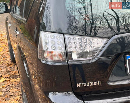 Черный Мицубиси Аутлендер ХЛ, объемом двигателя 3 л и пробегом 285 тыс. км за 9590 $, фото 9 на Automoto.ua