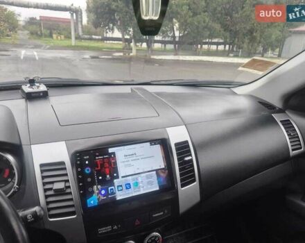 Черный Мицубиси Аутлендер ХЛ, объемом двигателя 2.36 л и пробегом 87 тыс. км за 11500 $, фото 9 на Automoto.ua