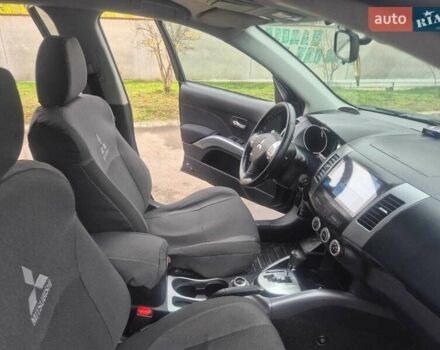 Черный Мицубиси Аутлендер ХЛ, объемом двигателя 2.36 л и пробегом 87 тыс. км за 11500 $, фото 3 на Automoto.ua