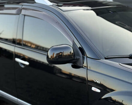 Чорний Міцубісі Аутлендер ХЛ, об'ємом двигуна 3 л та пробігом 243 тис. км за 12500 $, фото 10 на Automoto.ua