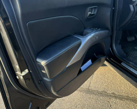 Черный Мицубиси Аутлендер ХЛ, объемом двигателя 2.36 л и пробегом 115 тыс. км за 12000 $, фото 14 на Automoto.ua