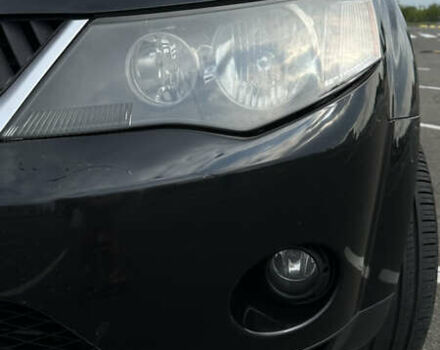 Черный Мицубиси Аутлендер ХЛ, объемом двигателя 2.4 л и пробегом 212 тыс. км за 9350 $, фото 9 на Automoto.ua