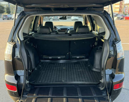 Черный Мицубиси Аутлендер ХЛ, объемом двигателя 2.36 л и пробегом 115 тыс. км за 12000 $, фото 26 на Automoto.ua