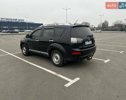 Черный Мицубиси Аутлендер ХЛ, объемом двигателя 2.36 л и пробегом 250 тыс. км за 10000 $, фото 8 на Automoto.ua