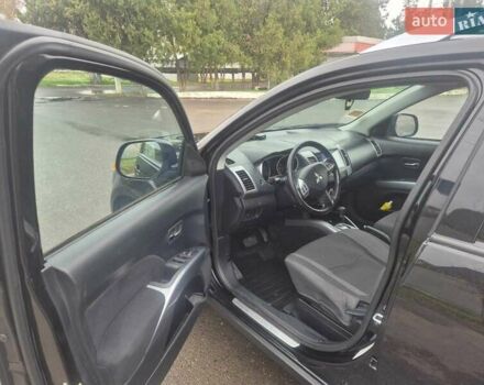 Черный Мицубиси Аутлендер ХЛ, объемом двигателя 2.36 л и пробегом 87 тыс. км за 11500 $, фото 13 на Automoto.ua