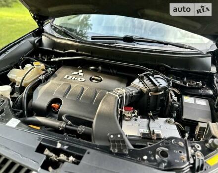 Чорний Міцубісі Аутлендер ХЛ, об'ємом двигуна 2 л та пробігом 172 тис. км за 9750 $, фото 92 на Automoto.ua