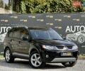 Чорний Міцубісі Аутлендер ХЛ, об'ємом двигуна 2.4 л та пробігом 104 тис. км за 10800 $, фото 1 на Automoto.ua