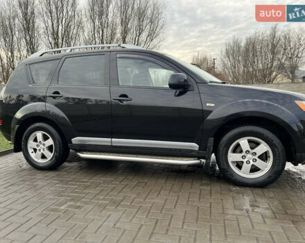 Черный Мицубиси Аутлендер ХЛ, объемом двигателя 2.36 л и пробегом 216 тыс. км за 7500 $, фото 4 на Automoto.ua