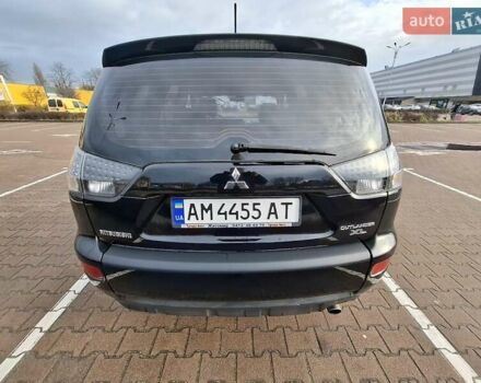 Черный Мицубиси Аутлендер ХЛ, объемом двигателя 2.36 л и пробегом 211 тыс. км за 10500 $, фото 4 на Automoto.ua