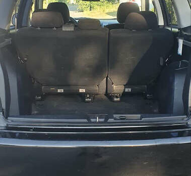 Чорний Міцубісі Аутлендер ХЛ, об'ємом двигуна 2.4 л та пробігом 325 тис. км за 7000 $, фото 4 на Automoto.ua