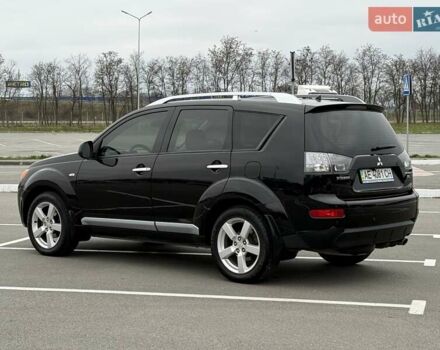 Черный Мицубиси Аутлендер ХЛ, объемом двигателя 2.36 л и пробегом 175 тыс. км за 9700 $, фото 13 на Automoto.ua
