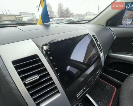 Черный Мицубиси Аутлендер ХЛ, объемом двигателя 2.4 л и пробегом 198 тыс. км за 9200 $, фото 15 на Automoto.ua