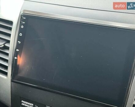 Черный Мицубиси Аутлендер ХЛ, объемом двигателя 3 л и пробегом 285 тыс. км за 9590 $, фото 19 на Automoto.ua