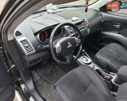 Черный Мицубиси Аутлендер ХЛ, объемом двигателя 2.4 л и пробегом 127 тыс. км за 10500 $, фото 32 на Automoto.ua