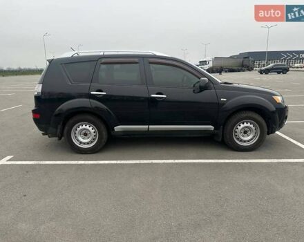 Черный Мицубиси Аутлендер ХЛ, объемом двигателя 2.36 л и пробегом 250 тыс. км за 10000 $, фото 11 на Automoto.ua