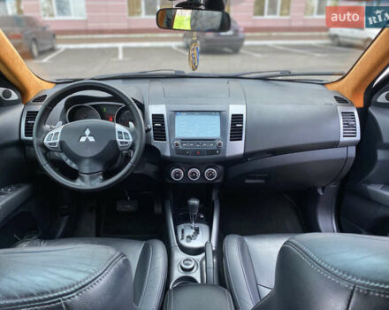 Черный Мицубиси Аутлендер ХЛ, объемом двигателя 3 л и пробегом 154 тыс. км за 8900 $, фото 39 на Automoto.ua