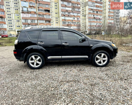 Чорний Міцубісі Аутлендер ХЛ, об'ємом двигуна 2.4 л та пробігом 229 тис. км за 9790 $, фото 7 на Automoto.ua
