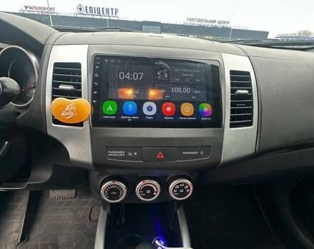 Черный Мицубиси Аутлендер ХЛ, объемом двигателя 2.36 л и пробегом 250 тыс. км за 10000 $, фото 17 на Automoto.ua