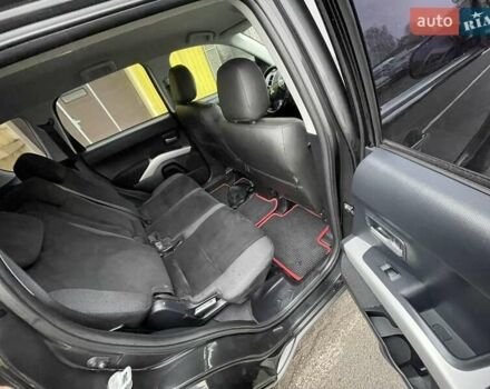 Черный Мицубиси Аутлендер ХЛ, объемом двигателя 2.4 л и пробегом 198 тыс. км за 9200 $, фото 12 на Automoto.ua