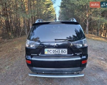 Черный Мицубиси Аутлендер ХЛ, объемом двигателя 2.4 л и пробегом 127 тыс. км за 10500 $, фото 22 на Automoto.ua