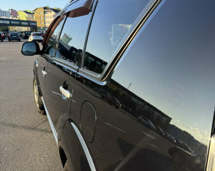 Черный Мицубиси Аутлендер ХЛ, объемом двигателя 2.36 л и пробегом 115 тыс. км за 12000 $, фото 4 на Automoto.ua