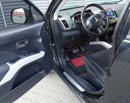 Чорний Міцубісі Аутлендер ХЛ, об'ємом двигуна 2.4 л та пробігом 181 тис. км за 8990 $, фото 28 на Automoto.ua