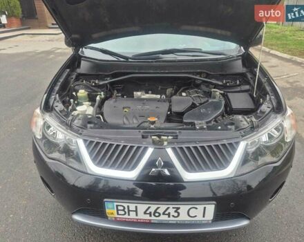 Черный Мицубиси Аутлендер ХЛ, объемом двигателя 2.36 л и пробегом 87 тыс. км за 11500 $, фото 2 на Automoto.ua