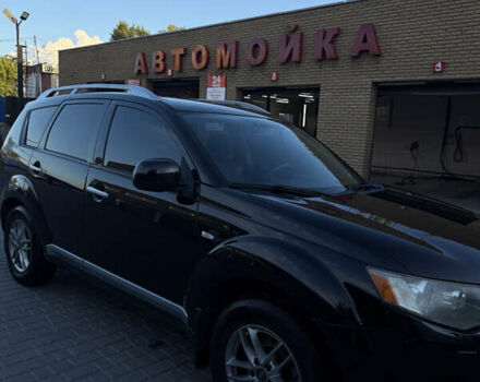 Черный Мицубиси Аутлендер ХЛ, объемом двигателя 2 л и пробегом 281 тыс. км за 9000 $, фото 2 на Automoto.ua