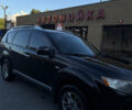 Черный Мицубиси Аутлендер ХЛ, объемом двигателя 2 л и пробегом 281 тыс. км за 9000 $, фото 2 на Automoto.ua