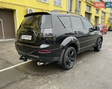 Черный Мицубиси Аутлендер ХЛ, объемом двигателя 2.4 л и пробегом 198 тыс. км за 9200 $, фото 4 на Automoto.ua